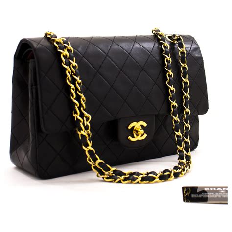 chanel black canvas and leather handbag|black chanel bag price.